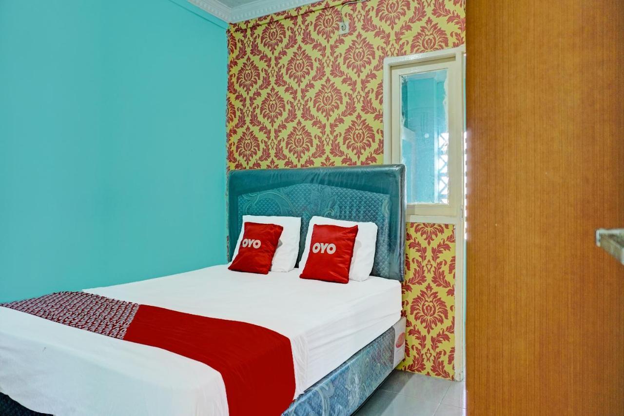 Oyo 91731 Home Stay Elis Cateliya Syariah Караванг Екстериор снимка
